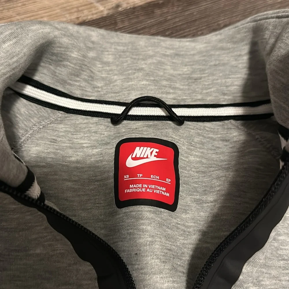 Nike Tech Gray Pullover Hoodie with Black Accents